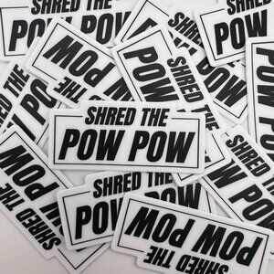 Shred the Pow Pow 2″ × 0.91″ Black & White Die-Cut Sticker
